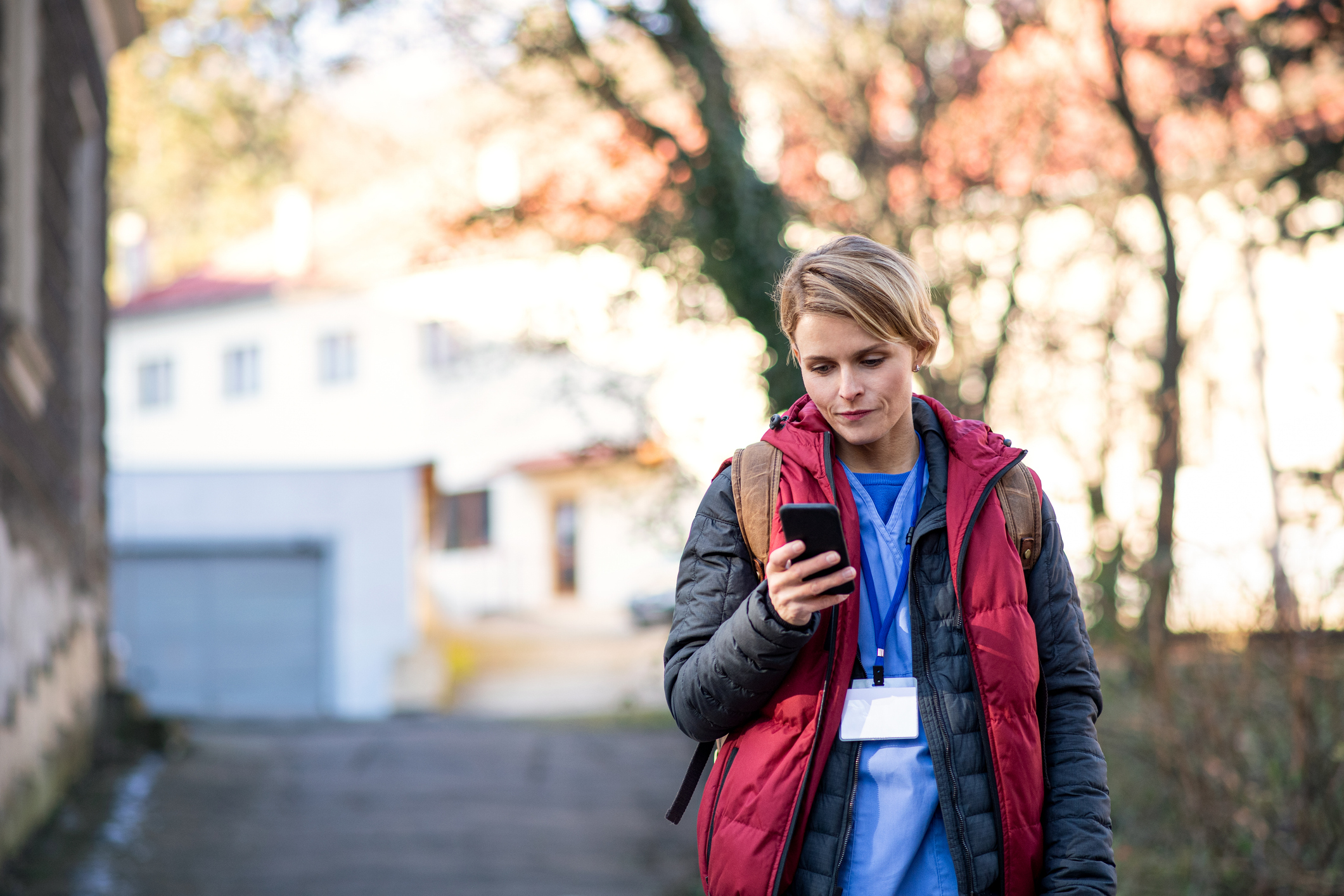 Woman using her phone to search for Plano detox centers in north central Texas.